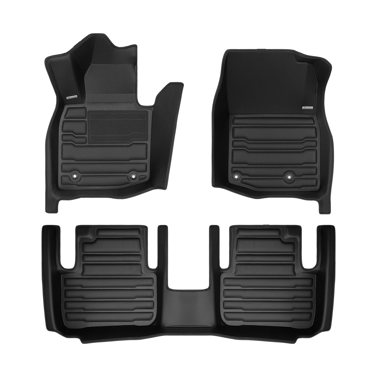 Set of black car floor mats on a white background