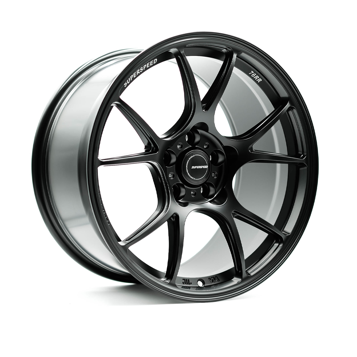 Black alloy wheel with visible branding on a white background