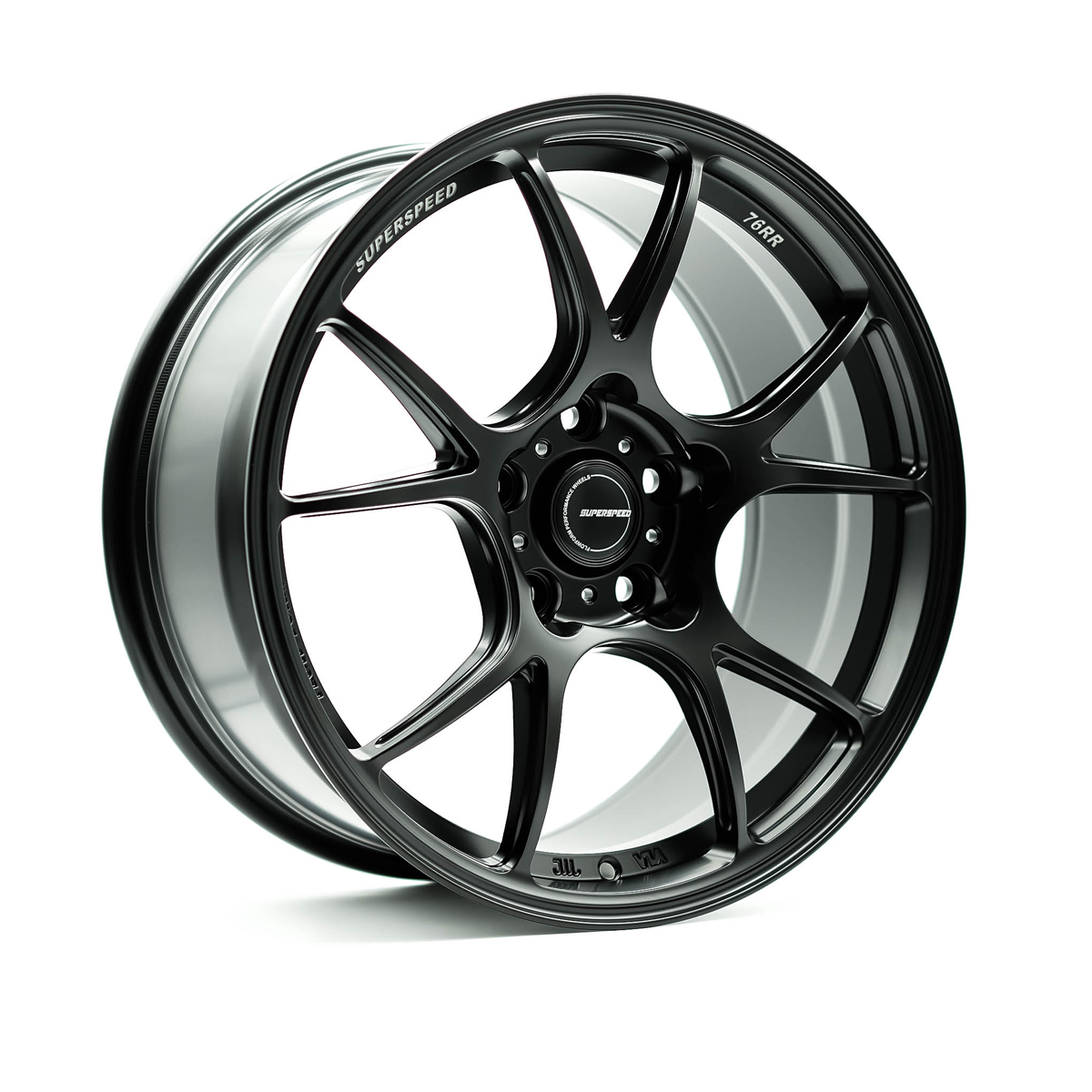 Black alloy wheel with 'SuperSpeed' branding on a white background
