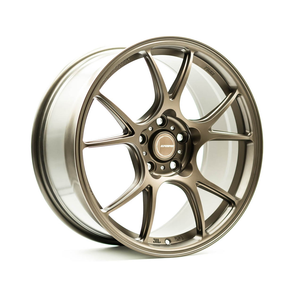 Bronze alloy wheel on a white background