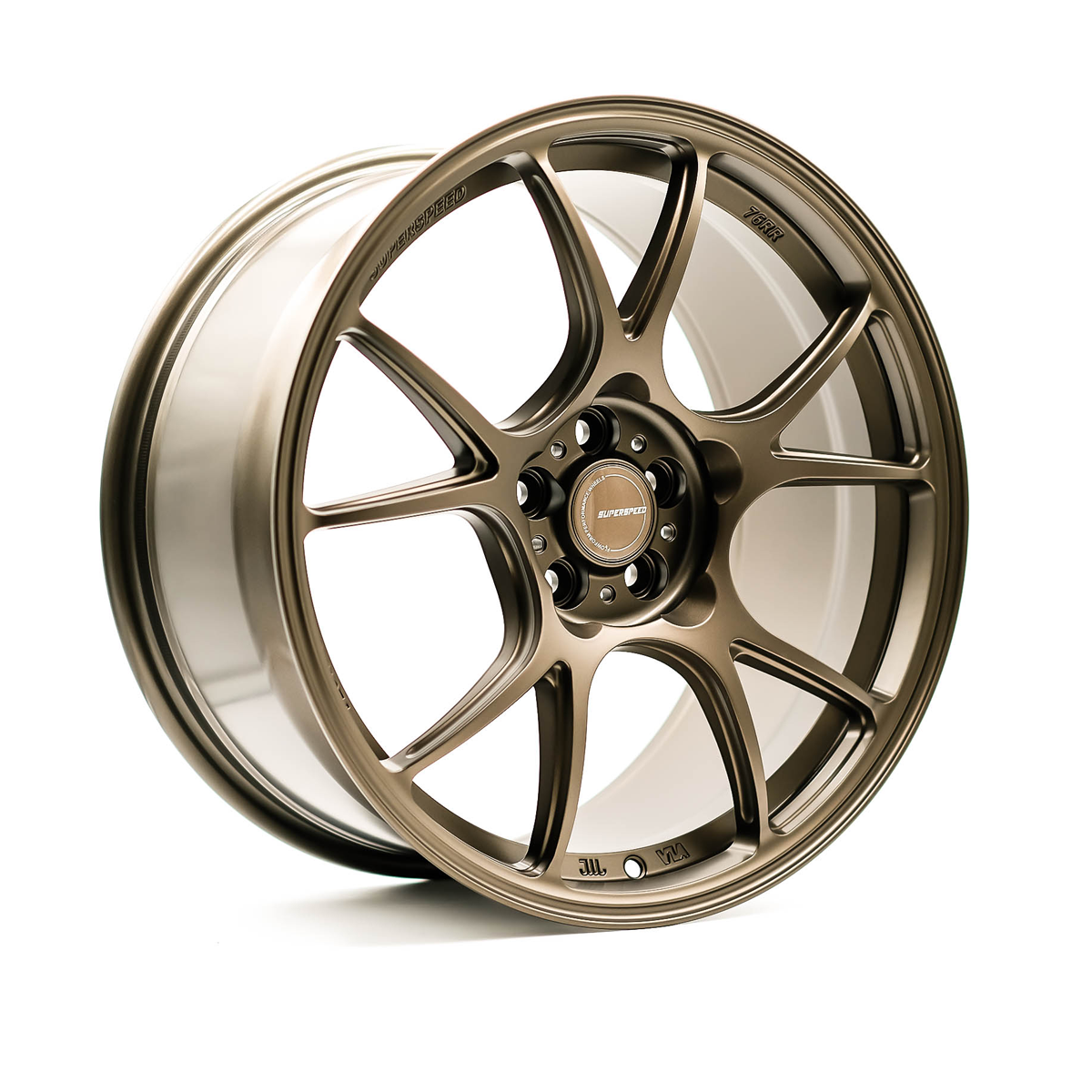 Bronze alloy wheel on a white background