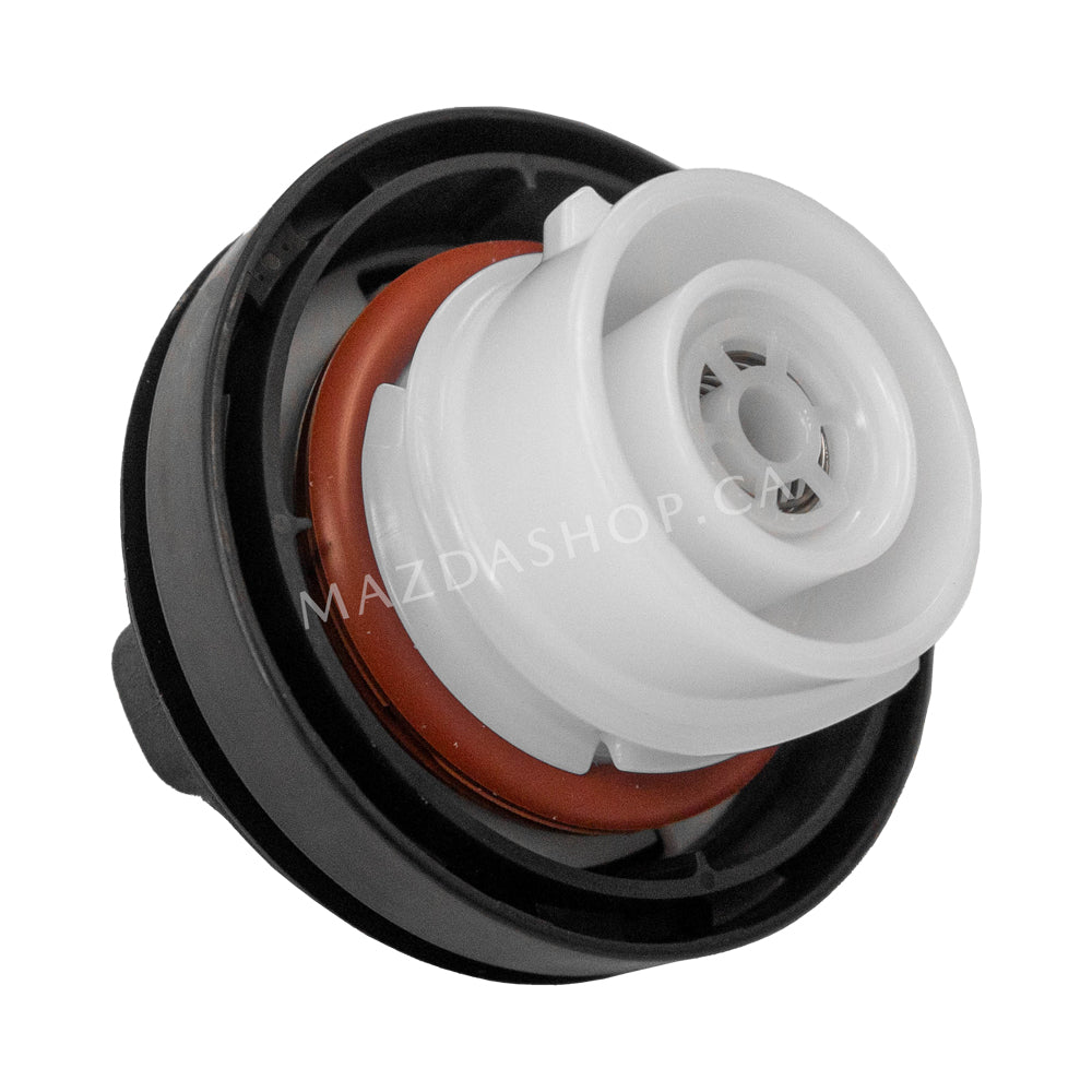 Fuel cap with a red gasket on a white background