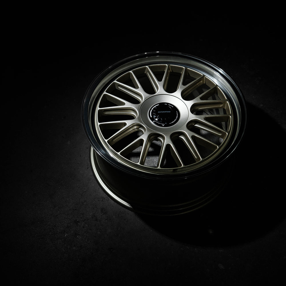 Car wheel rim on a black background